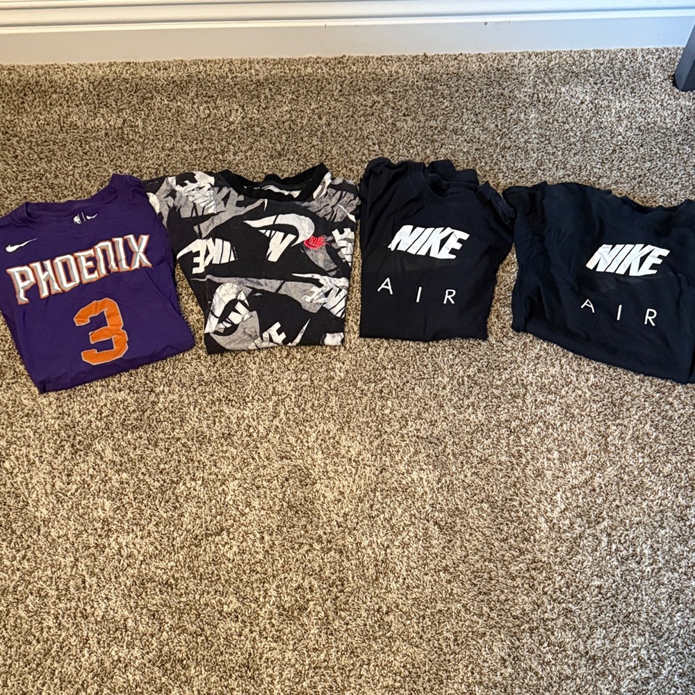 Nike Kids Purple Phoenix Jersey and Black Graphic Tees